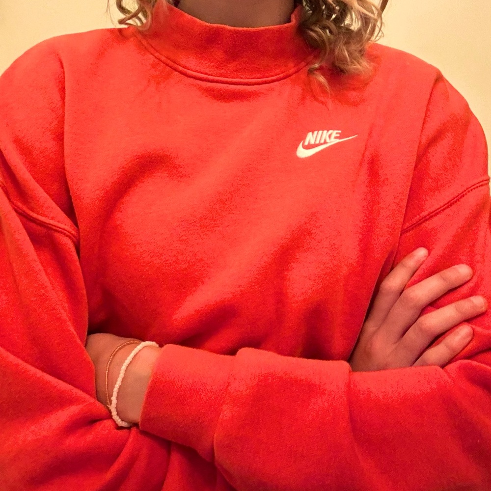 Red extra small nike sweat shirt.